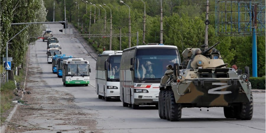 Buses with Ukrainian POWs leave the Azovstal plant in Mariupol, May 17, 2022