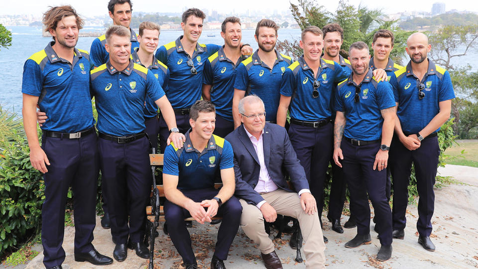 Scott Morrison, pictured here posing for photographs with Tim Paine and the Australian cricket team at Kirribili House.