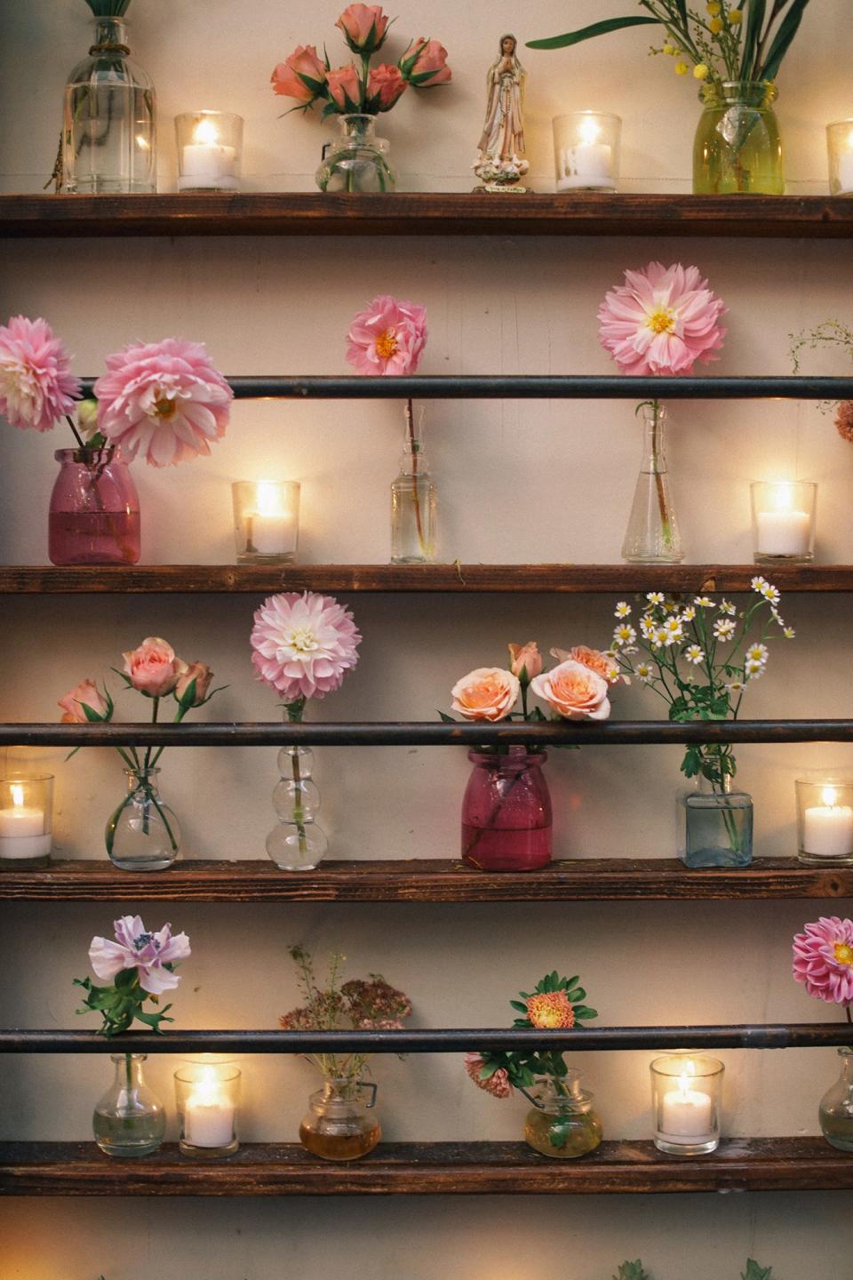 For the ceremony and lunch, I wanted a mix of all different flowers in fun, bright colors. Fox Fodder Farm did an incredible job bringing this to life. I loved how all of the bud vases were different shapes and sizes, and the arrangements looked like they were hand-picked from a garden.