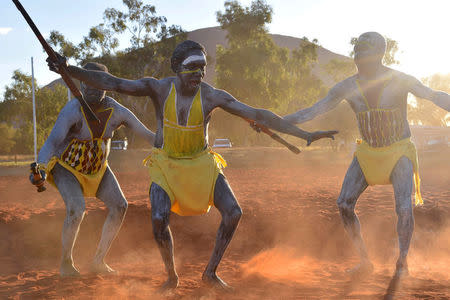 Performers from East Arnhem Land dance during the opening ceremony for the National Indigenous Constitutional Convention, a three day conference designed to come up with a consensus response on how indigenous people should be recognised in Australia's constitution, at Mutitjulu near Uluru in central Australia, May 23, 2017. AAP/Lucy Hughes Jones/via REUTERS