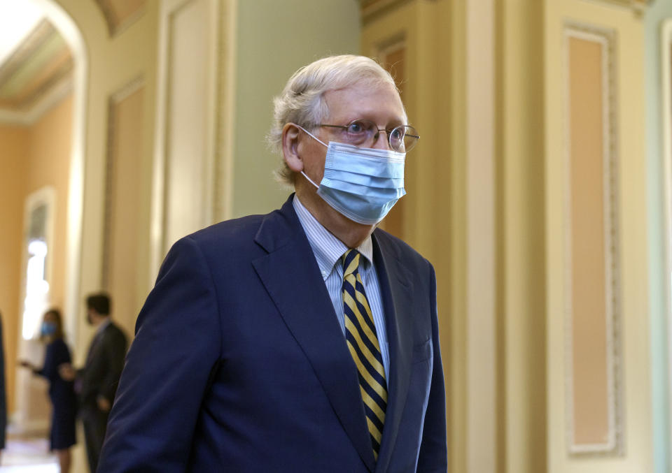 Senate Majority Leader Mitch McConnell, R-Ky., walks to the chamber to speak about the death of Supreme Court Justice Ruth Bader Ginsburg, at the Capitol in Washington, Monday, Sept. 21, 2020. Her death leaves a vacancy that could be filled by a more conservative justice by President Donald Trump. (AP Photo/J. Scott Applewhite)