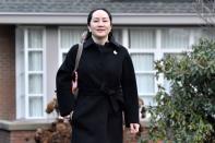 Huawei Chief Financial Officer Meng leaves her home to attend her extradition hearing in Vancouver