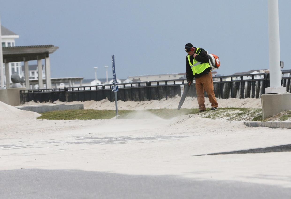 Hampton Beach and its stretch of sidewalks, parking lots and roadways were pelted by two winter storms in January. Now work crews are in the process of cleaning up debris for the upcoming tourism season.