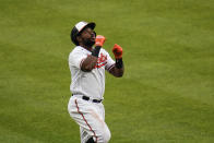 Baltimore Orioles' Maikel Franco reacts while running the the bases after hitting a two-run home run off New York Yankees relief pitcher Wandy Peralta (58) during the seventh inning of a baseball game, Sunday, May 16, 2021, in Baltimore. Orioles' Pedro Severino scored on the play. (AP Photo/Julio Cortez)