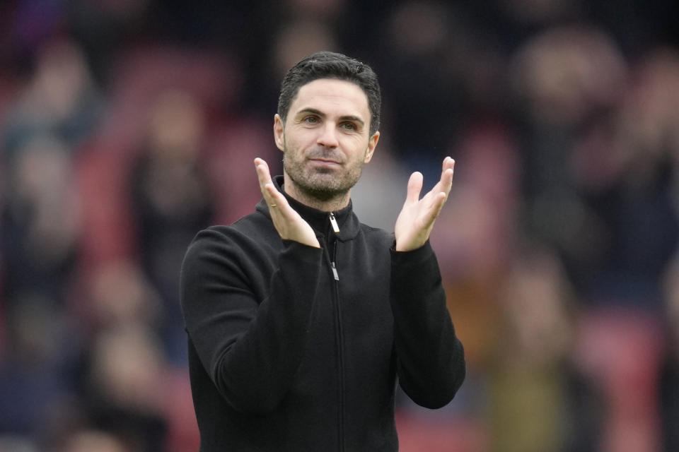 Arsenal's manager Mikel Arteta applaud supporters at the end of the English Premier League soccer match between Arsenal and Crystal Palace at Emirates stadium in London, Sunday, March 19, 2023. (AP Photo/Kirsty Wigglesworth)