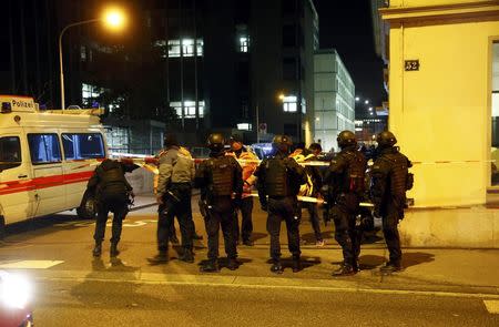 Police stand outside an Islamic center in central Zurich, Switzerland December 19, 2016. REUTERS/Arnd Wiegmann