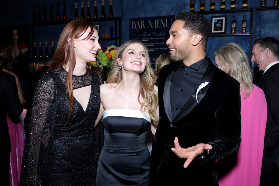 Sophie Turner with two other people at an event