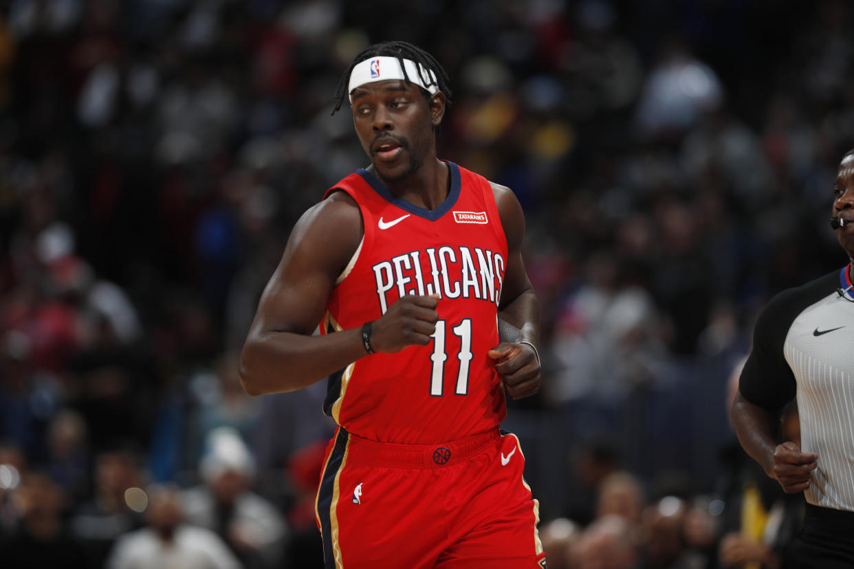 New Orleans Pelicans guard Jrue Holiday (11) in the first half of an NBA basketball game Wednesday, Dec. 25, 2019, in Denver. (AP Photo/David Zalubowski)