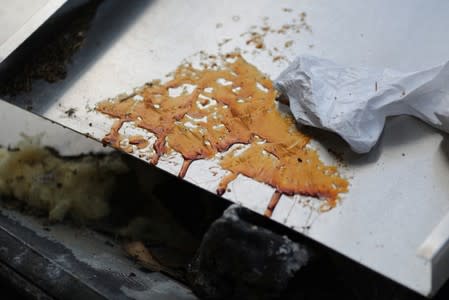 Hash oil is seen outside a suburban home that was the site of a hash oil extraction laboratory explosion in the Mira Mesa area of San Diego