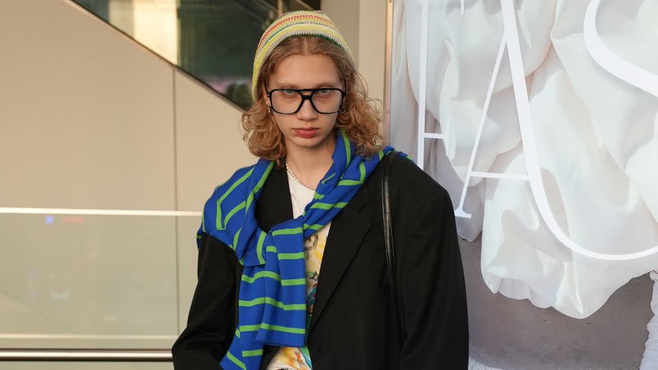 Model Yunna Badova, pictured outside Support Surface’s show on Friday, wore a selection of vintage items from Russia. “Japanese people’s style is amazing,” she said, "Every person in Japan has their own style.” - Himari Semans/CNN