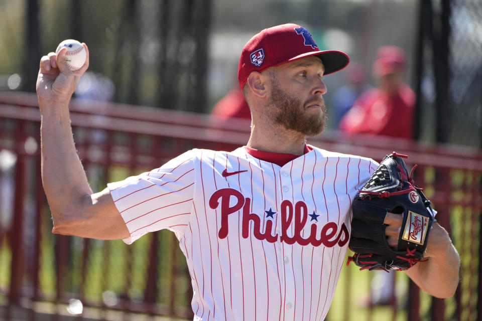 Philadelphia Phillies pitcher Zack Wheeler throws during a baseball spring training workout Wednesday, Feb. 14, 2024, in Clearwater, Fla. (AP Photo/Charlie Neibergall)