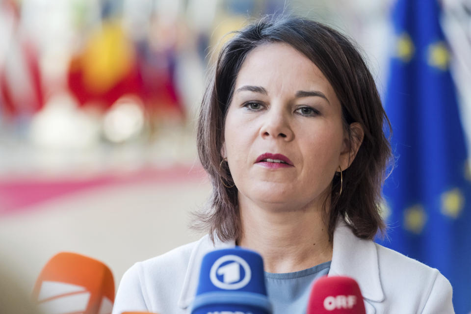 Germany's Foreign Minister Annalena Baerbock speaks with journalists as she arrives for a meeting of EU foreign ministers at the EU Council building in Brussels, Monday, Nov. 14, 2022. EU foreign ministers will hold exchanges of views on the Russian aggression against Ukraine, the Great Lakes region and Western Balkans. (AP Photo/Geert Vanden Wijngaert)