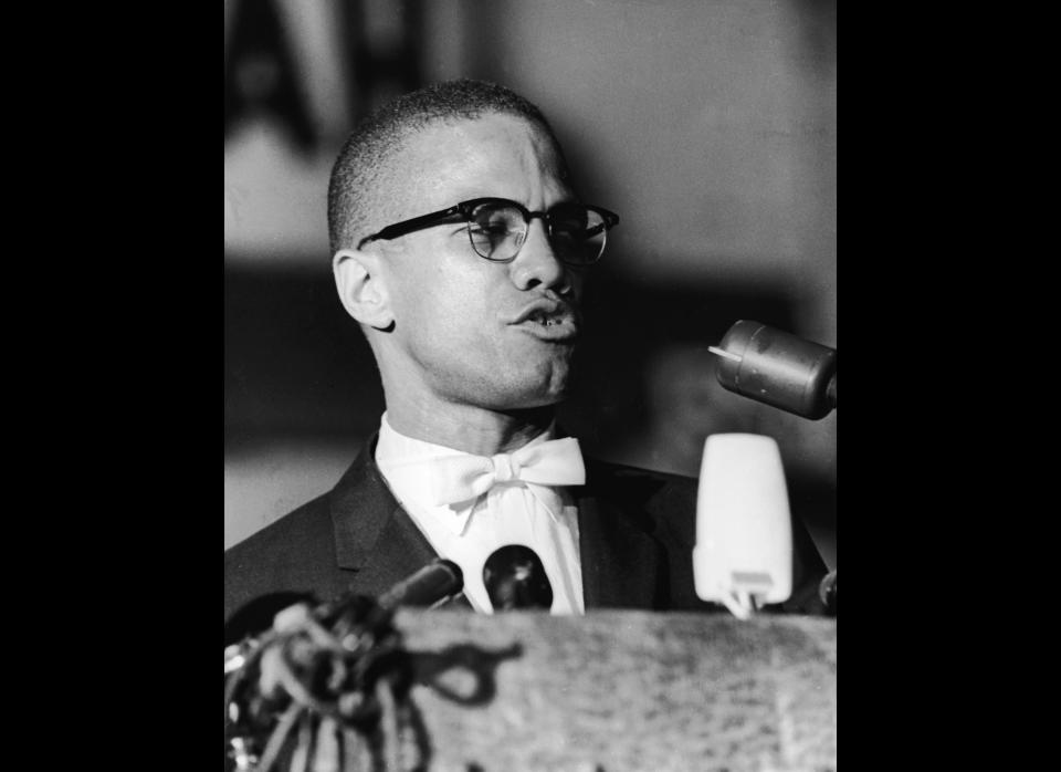 American political activist and radical civil rights leader, Malcolm X (1925 - 1965) speaks from a podium during a rally of African-American Muslims in Washington DC. He is dressed in a formal jacket and a white bow-tie. (Richard Saunders, Pictorial Parade / Getty Images)