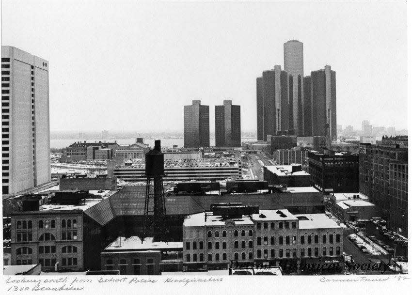 A 1982 photo shows the view from the roof of Detroit Police Headquarters. In the background are the Blue Cross Blue Shield Building, Renaissance Center and Detroit River.