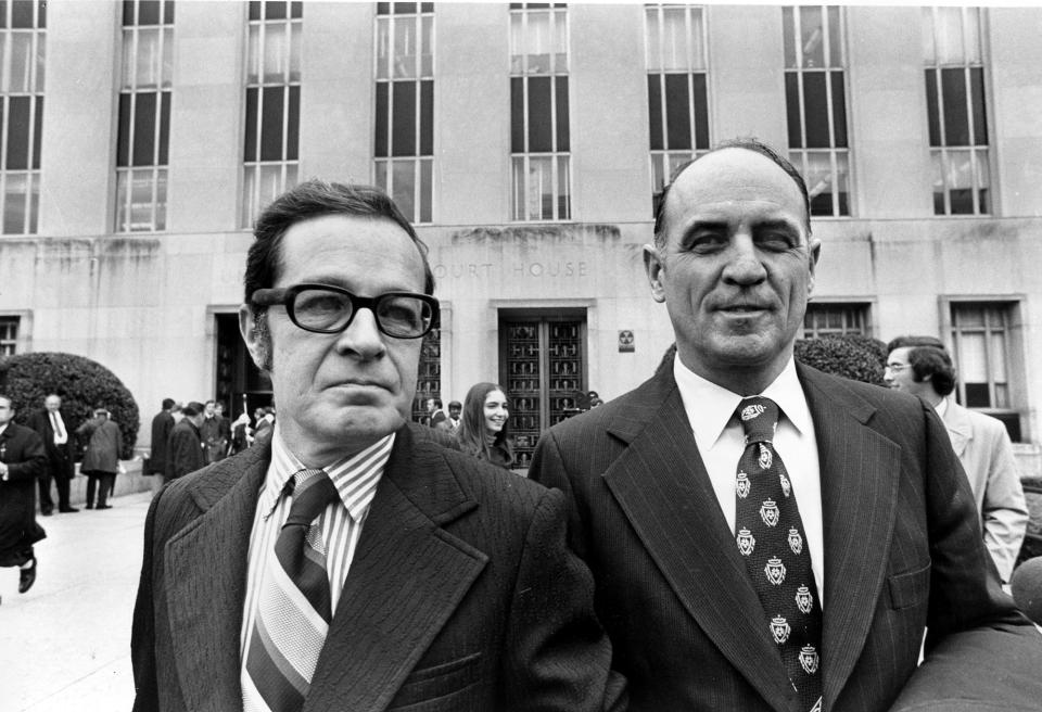 <p>James W. McCord Jr., right, former security chief for President Richard Nixon’s re-election committee, and his attorney Bernard Fensterwald, leave U.S. District Court in Washington, D.C., Friday, Nov. 9, 1973. Judge Sirica imposed a sentence of one to five years on McCord for his role in the Watergate break-in. (Photo: AP) </p>