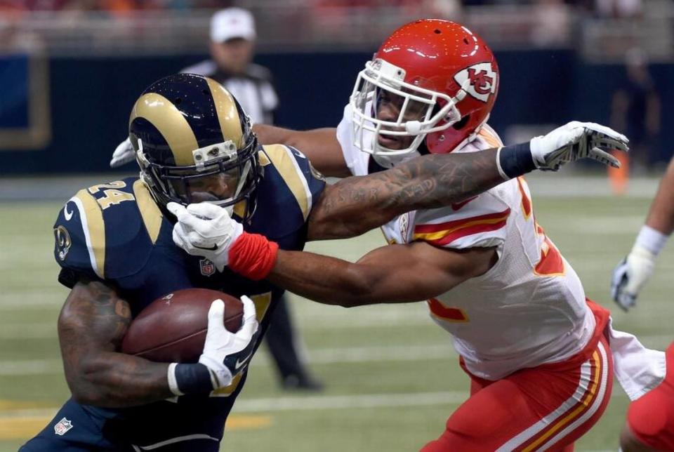 The Kansas City Chiefs’ Marcus Cooper brings down then-St. Louis Rams running back Isaiah Pead by his facemask during a game in 2015 when the Rams still called St. Louis home. They moved back to Los Angeles following that season and, along with the Chiefs, were one of the teams listed in the BND’s latest poll on whether you still root for a team in the NFL.