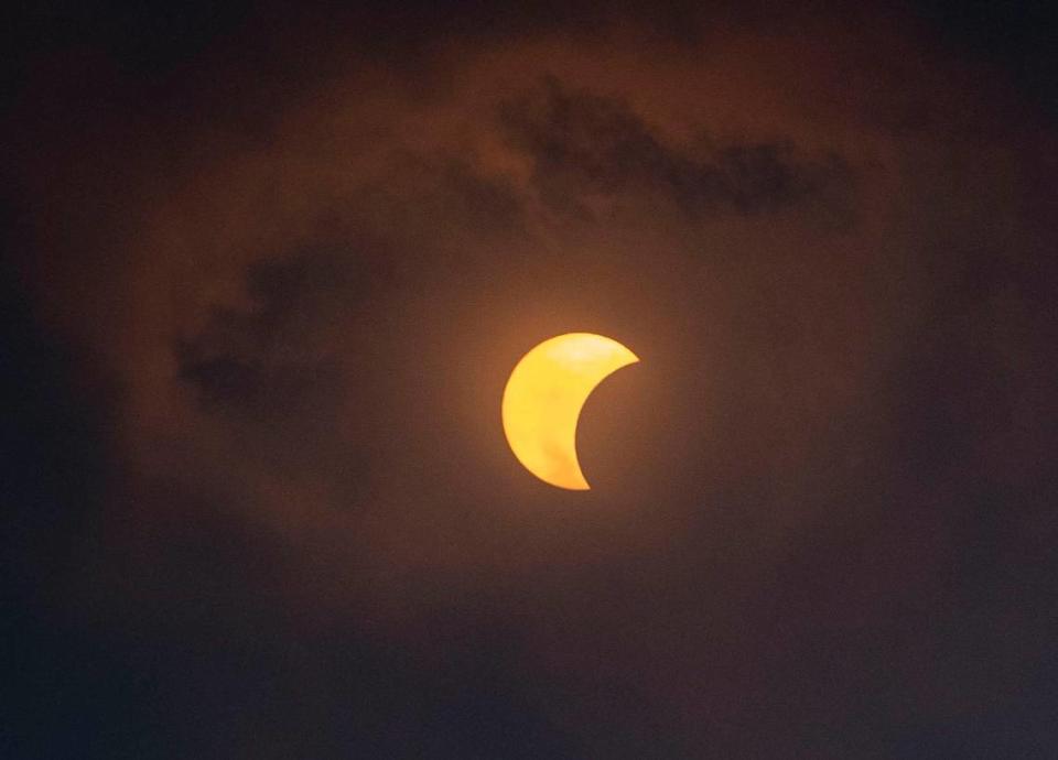 The partial solar eclipse reaching about 40% on Monday, April 8, 2024, at The Phillip and Patricia Frost Museum of Science in downtown Miami.