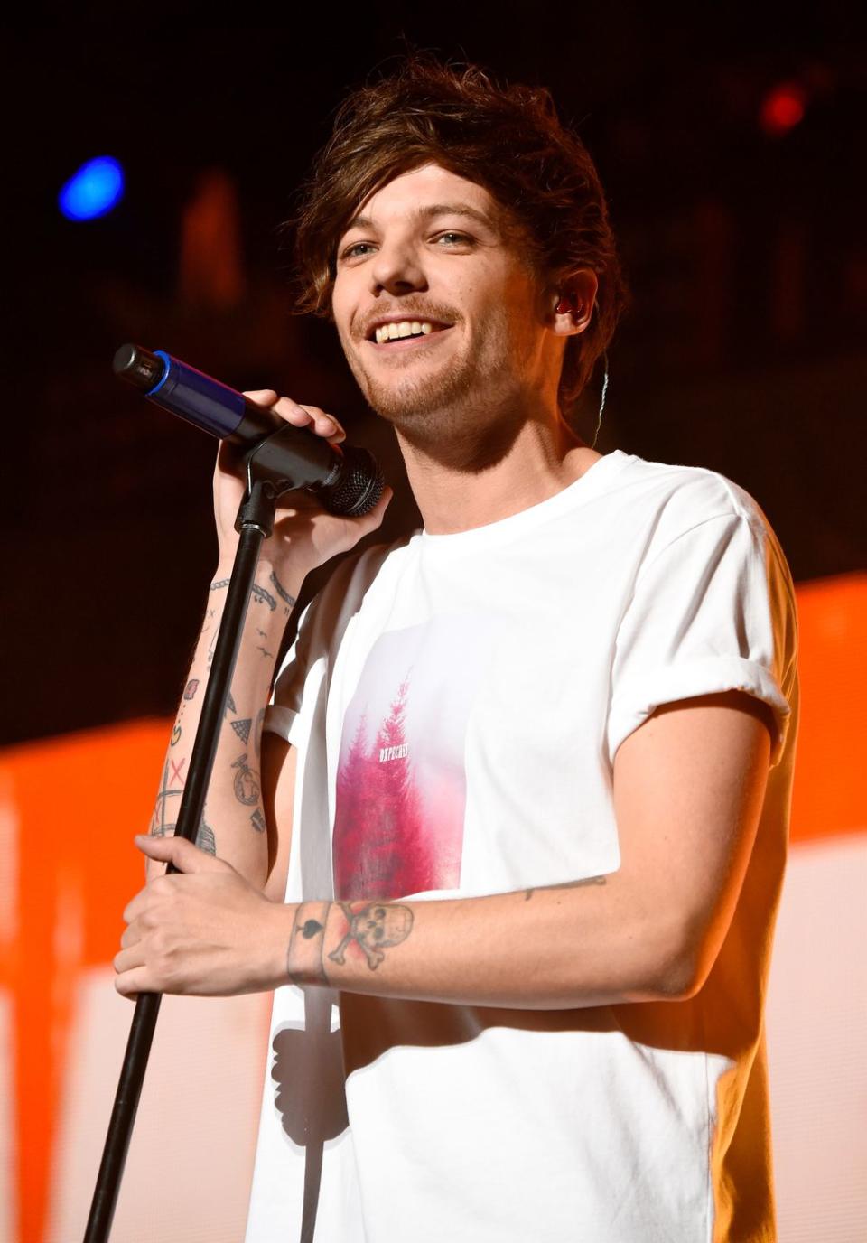 Louis Tomlinson calls out lack of bands