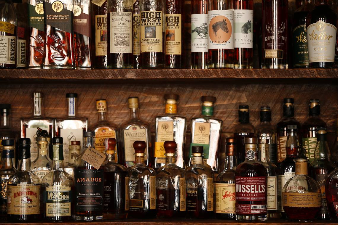 A selection of bourbon sat on shelves Tuesday at The Amsden Bourbon Bar in Versailles. The Amsden Bourbon Bar is open daily and features seasonal and classic cocktails. Alex Slitz/aslitz@herald-leader.com