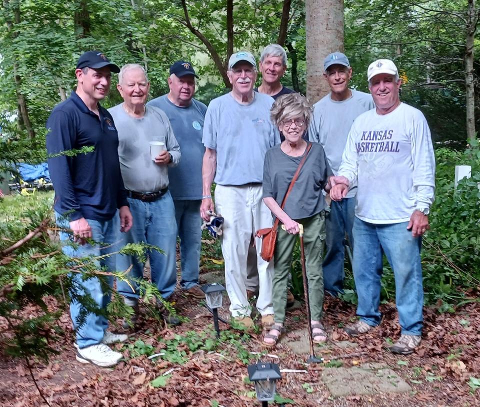 The Knights of Columbus Helping Hands crew, with Bill Shinnick on the right and columnist Saralee Perel in front, at Bob and Saralee’s home in Marstons Mills.