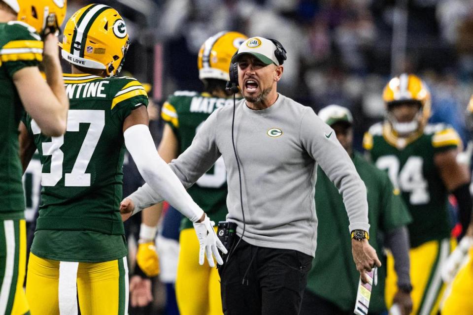 Packers Head Coach Matt LeFleur celebrates with his defense after getting a stop in the third quarter of the NFC Wild Card game between the Dallas Cowboys and the Green Bay Packers at AT&T Stadium in Arlington on Sunday, Jan. 14, 2024.