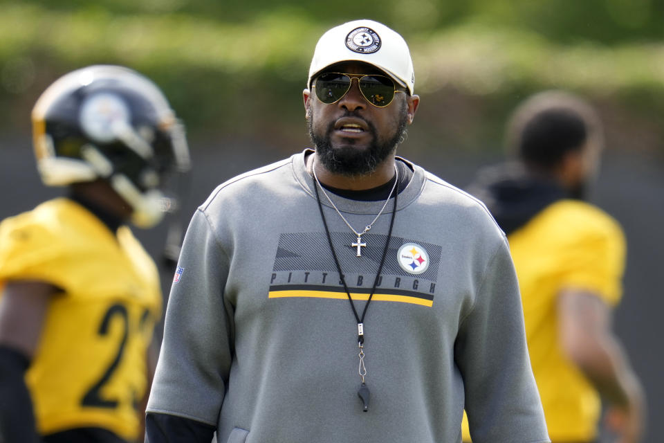 FILE - Pittsburgh Steelers head coach Mike Tomlin watches the NFL football team' practice in Pittsburgh Tuesday, May 23, 2023. (AP Photo/Gene J. Puskar, File)