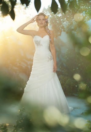 <div class="caption-credit"> Photo by: Alfred Angelo</div><div class="caption-title">Princess Rapunzel</div>Confident and sophisticated, this fitted gown of draped, soft net twists and turns like Rapunzel's flowing tresses. The bodice is accented with beading that radiates the energy and love of skyward lanterns. <i><br> <a href="http://www.babble.com/mom/2013-disneys-fairy-tale-weddings-dresses/?cmp=ELP|bbl|lp|YahooShine|Main||030413|||famE|||" rel="nofollow noopener" target="_blank" data-ylk="slk:Get the dress here;elm:context_link;itc:0;sec:content-canvas" class="link ">Get the dress here</a> <br> <a href="http://www.babble.com/mom/11-hilarious-photos-depicting-how-wives-should-undress-in-front-of-their-husbands-circa-1937/" rel="nofollow noopener" target="_blank" data-ylk="slk:Related: 11 hilarious tips for undressing in front of your lover (circa 1937);elm:context_link;itc:0;sec:content-canvas" class="link "><b>Related: 11 hilarious tips for undressing in front of your lover (circa 1937)</b></a></i>