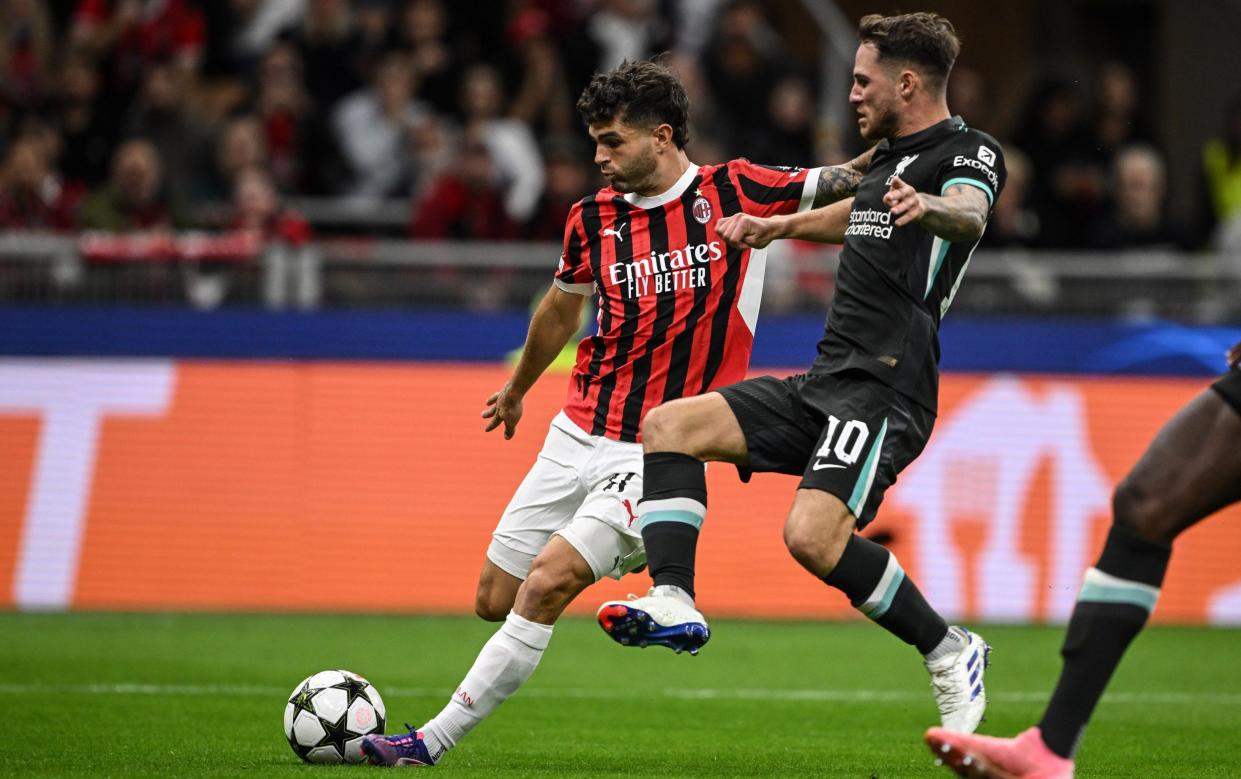 AC Milan's Christian Pulisic scores the opening goal against Liverpool during their 3-1  Champions League MD1 defeat at Stadio San Siro on September 17, 2024