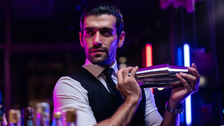 bartender shaking a cocktail