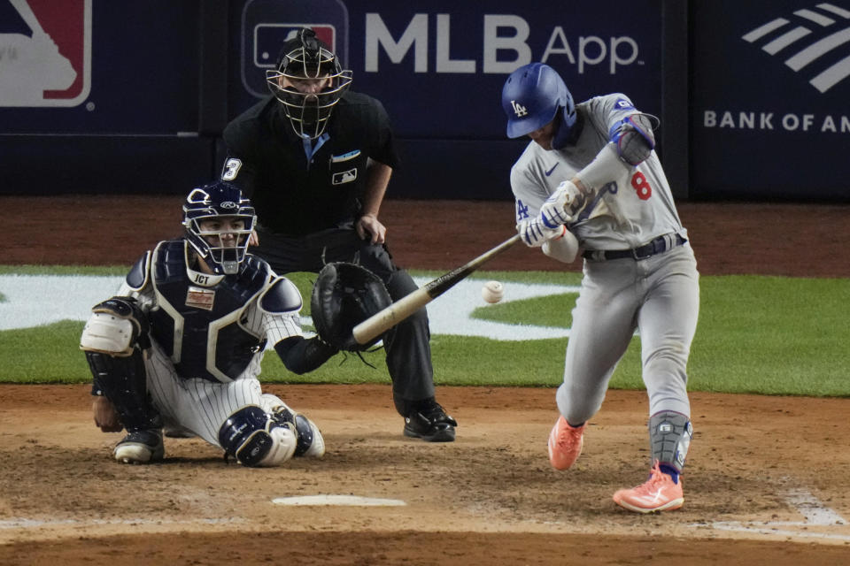 Los Angeles Dodgers' Kiké Hernández hits a double against the New York Yankees during the seventh inning of a baseball game Friday, June 7, 2024, in New York. (AP Photo/Frank Franklin II)