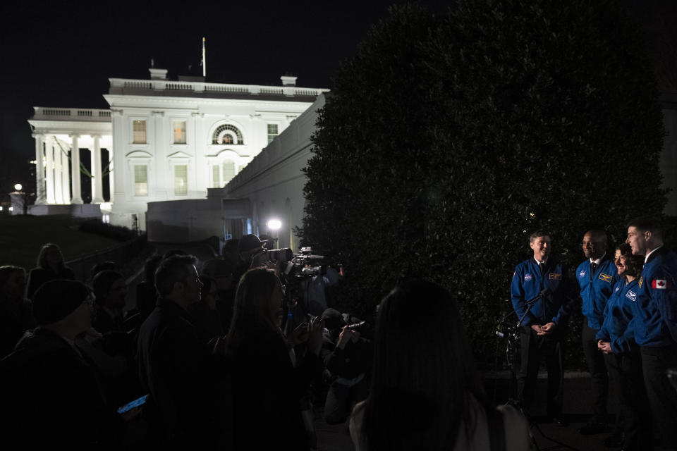 Artemis II crew members from left, Reid Wiseman, Victor Glover, Christina Hammock Koch, and Jeremy Hansen speak to members of the media outside the West Wing of the White House in Washington, Thursday, Dec. 14, 2023, after meeting with President Joe Biden. (AP Photo/Andrew Harnik)