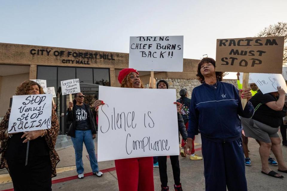 Forest Hill residents rally and hold signs in support of Police Chief Eddie Burns Sr., who was fired last month after being on medical leave, in front of Forest Hill City Hall on Friday, March 1, 2024.