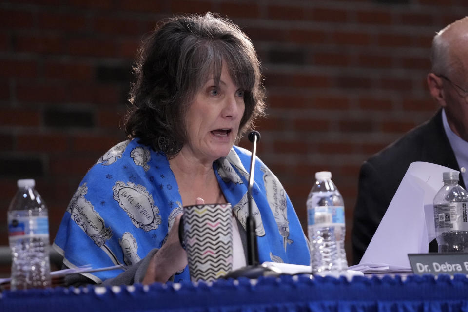 Dr. Debra Baeder questions a witness, Thursday, April 25, 2024, in Augusta, Maine, during a hearing of the independent commission investigating the law enforcement response to the mass shooting in Lewiston, Maine. (AP Photo/Robert F. Bukaty)