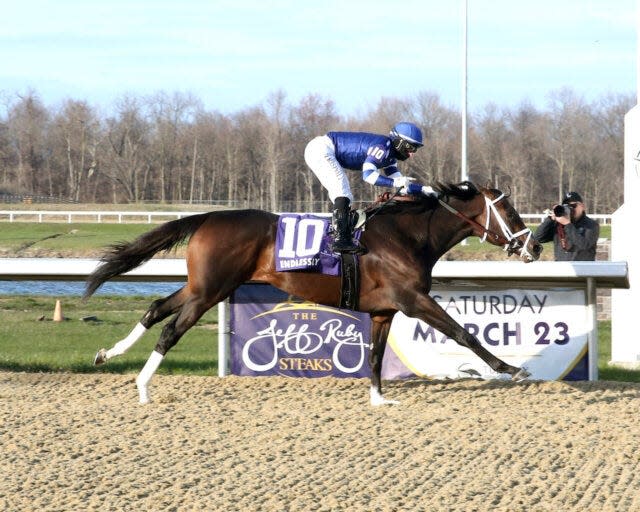 Endlessly and jockey Umberto Rispoli win the Grade 3 Jeff Ruby Steaks on March 23 at Turfway Park.