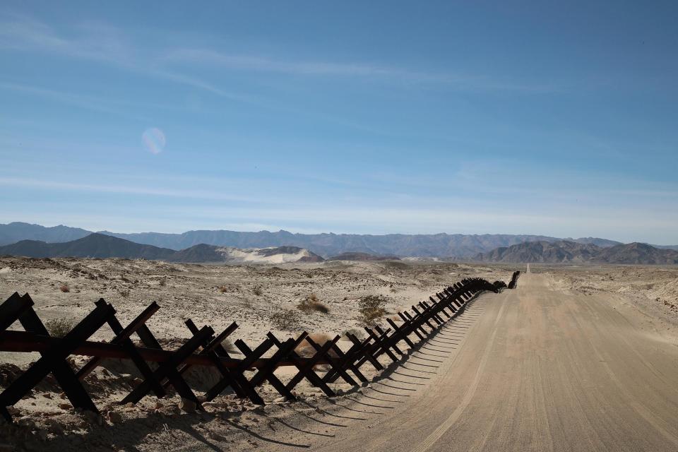 A steel barrier runs along the border of the United States and Mexico on January 26, 2019 near Calexico, California.