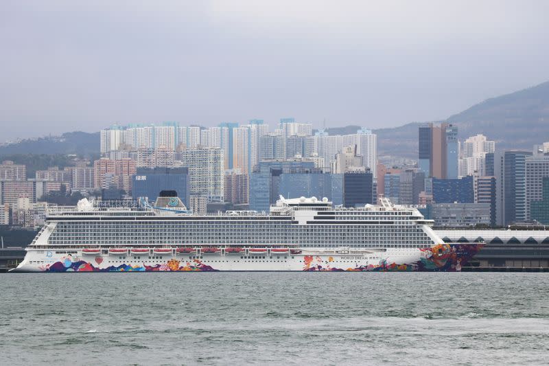 The World Dream ship, which had been denied entry in Taiwan's Kaohsiung amid concerns of coronavirus infection on board, is seen docked at the Kai Tak Cruise Terminal in Hong Kong