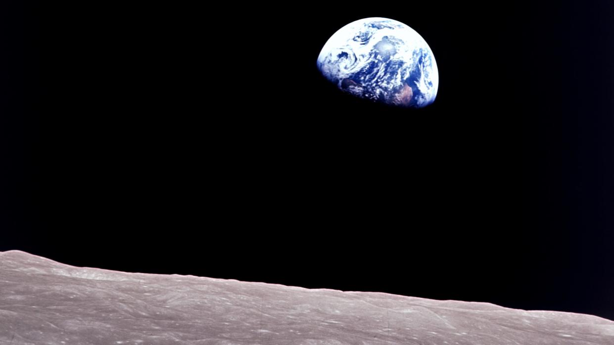  Taken aboard Apollo 8 by Bill Anders, this iconic picture shows Earth peeking out from beyond the lunar surface as the first crewed spacecraft circumnavigated the Moon, with astronauts Anders, Frank Borman, and Jim Lovell aboard. 