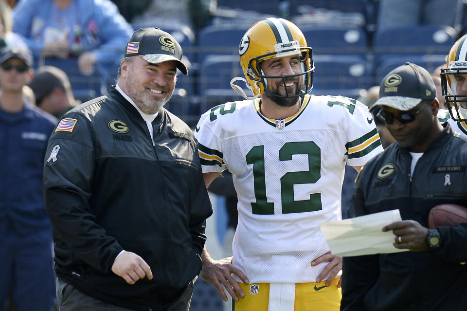 FILE - Green Bay Packers head coach Mike McCarthy talks with quarterback Aaron Rodgers (12) before an NFL football game against the Tennessee Titans Sunday, Nov. 13, 2016, in Nashville, Tenn. Packers quarterback Aaron Rodgers won his lone Super Bowl title with Mike McCarthy as his coach before their relationship eventually soured. Rodgers says they’ve since made amends and communicated recently as McCarthy prepares to return to Lambeau Field to work the opposing sideline as the Dallas Cowboys’ coach. (AP Photo/Mark Zaleski, File)