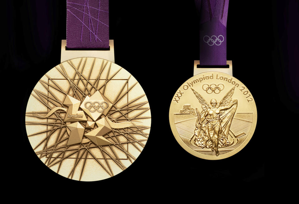 <p>The London 2012 Olympic gold medal designed by British artist David Watkins. (AP Photo/LOCOG, HO) </p>
