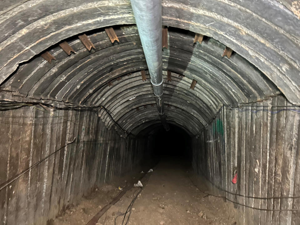 Although Israel’s military believes it has cleared any Hamas presence from the tunnel, troops with weapons drawn stand guard part of the way inside.  (Josh Lederman / NBC News)