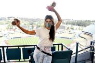 <p>Marisa Tomei hands out Milk Bar cookies to early voters as part of the Election Super Centers project at Dodger Stadium on Sunday in L.A.</p>