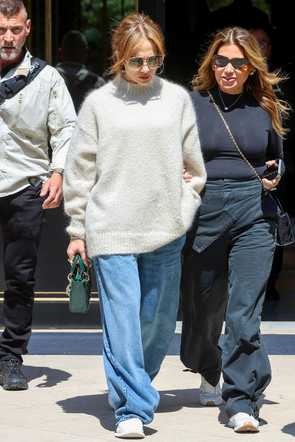 Jennifer Lopez in Paris wearing athletic sneakers