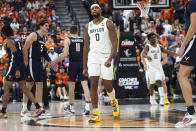 Baylor forward Flo Thamba (0) looks at the scoreboard as the team trails Virginia during the second half of an NCAA college basketball game Friday, Nov. 18, 2022, in Las Vegas. (AP Photo/Chase Stevens)