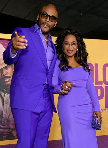 <p>JC Olivera/GA/The Hollywood Reporter via Getty Images</p> Tyler Perry and Oprah Winfrey at 'The Color Purple' world premiere in Los Angeles