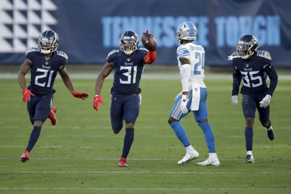 Tennessee Titans free safety Kevin Byard (31) celebrates after scoring against the Detroit Lions during the second half of an NFL football game Sunday, Dec. 20, 2020, in Nashville, N.C. (AP Photo/Ben Margot)