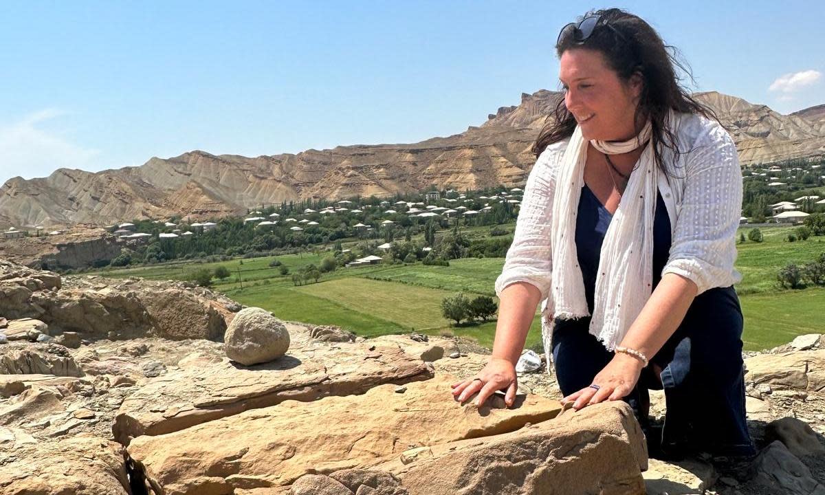 <span>Bettany Hughes at an archaeological site in Azerbaijan for her Treasures of the World series.</span><span>Photograph: SandStone Global Productions Ltd</span>