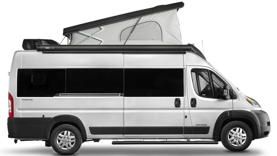 The Airstream Rangeline Touring Coach from the side with the pop-up tent add-on