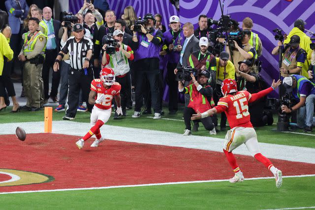 <p>Ethan Miller/Getty</p> Mecole Hardman and Patrick Mahomes