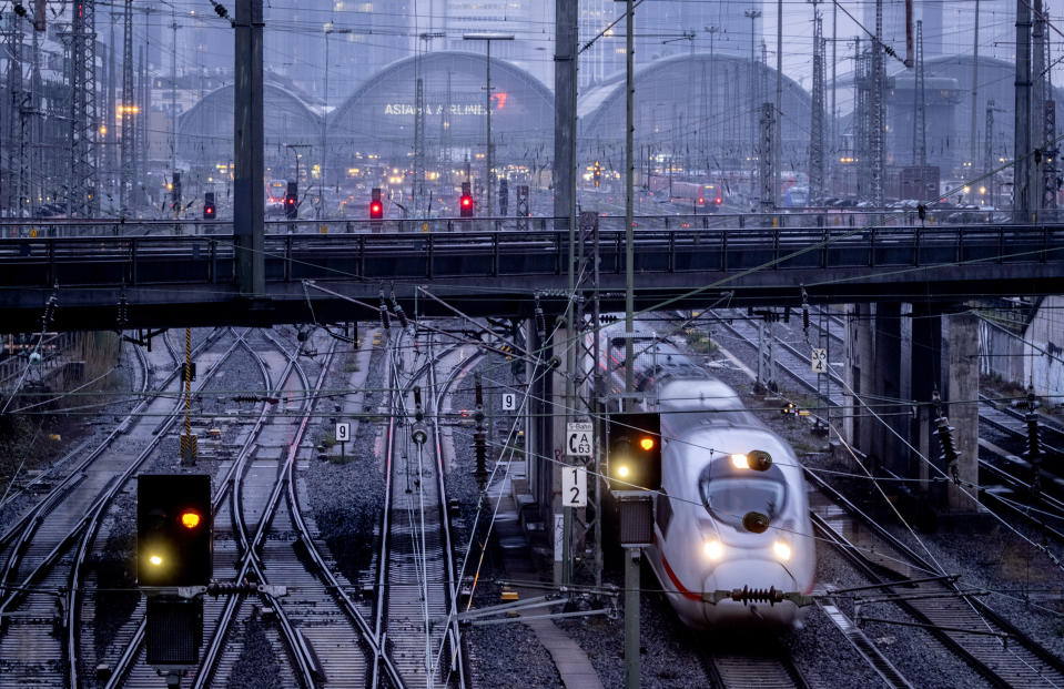 A train approaches the central train station in Frankfurt, Germany, Monday, March 11, 2024. German train drivers union GDL called for another strike starting early Tuesday. (AP Photo/Michael Probst)