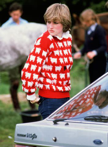 <p>Tim Graham Photo Library via Getty Images</p> Princess Diana wearing her black sheep sweater in June 1981